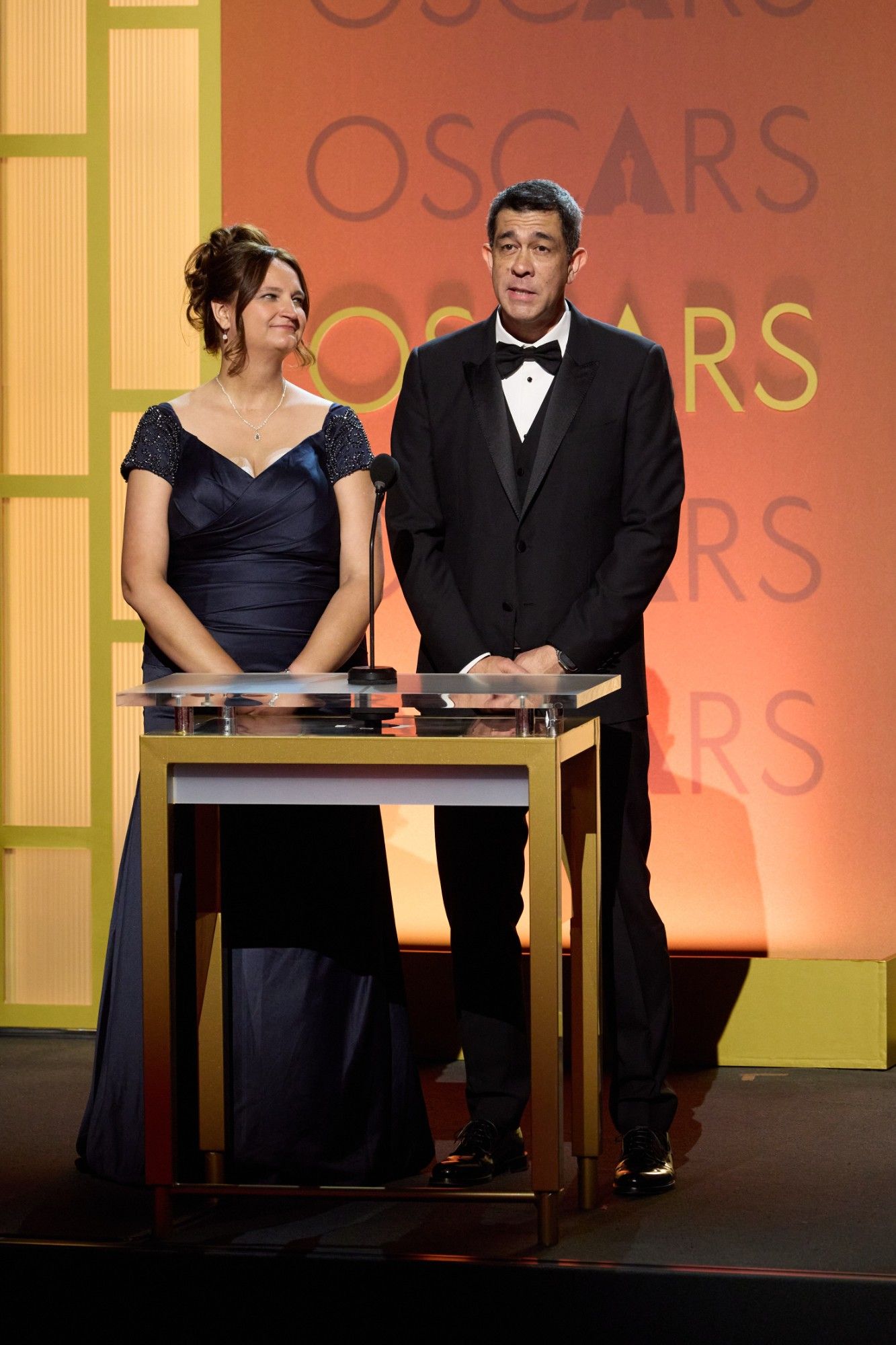 Darin Grant and Rachel Rose, Co-Chairs, at the podium of the 2026 Academy Scientific and Technical Awards